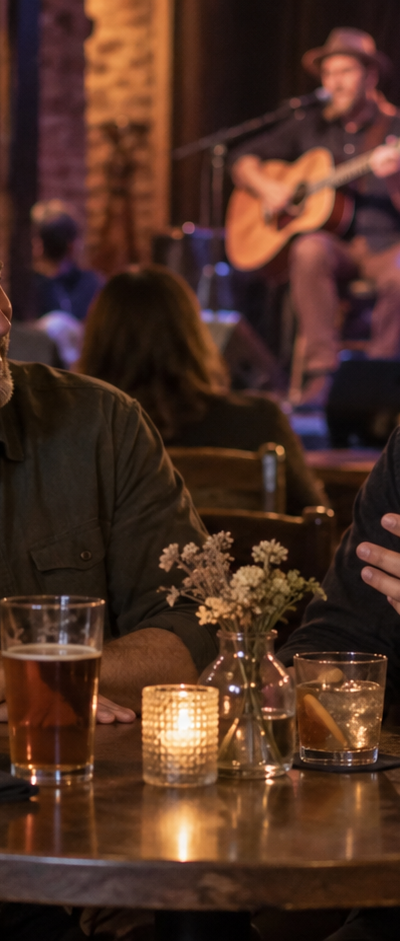 Friends listening to live music at a bar